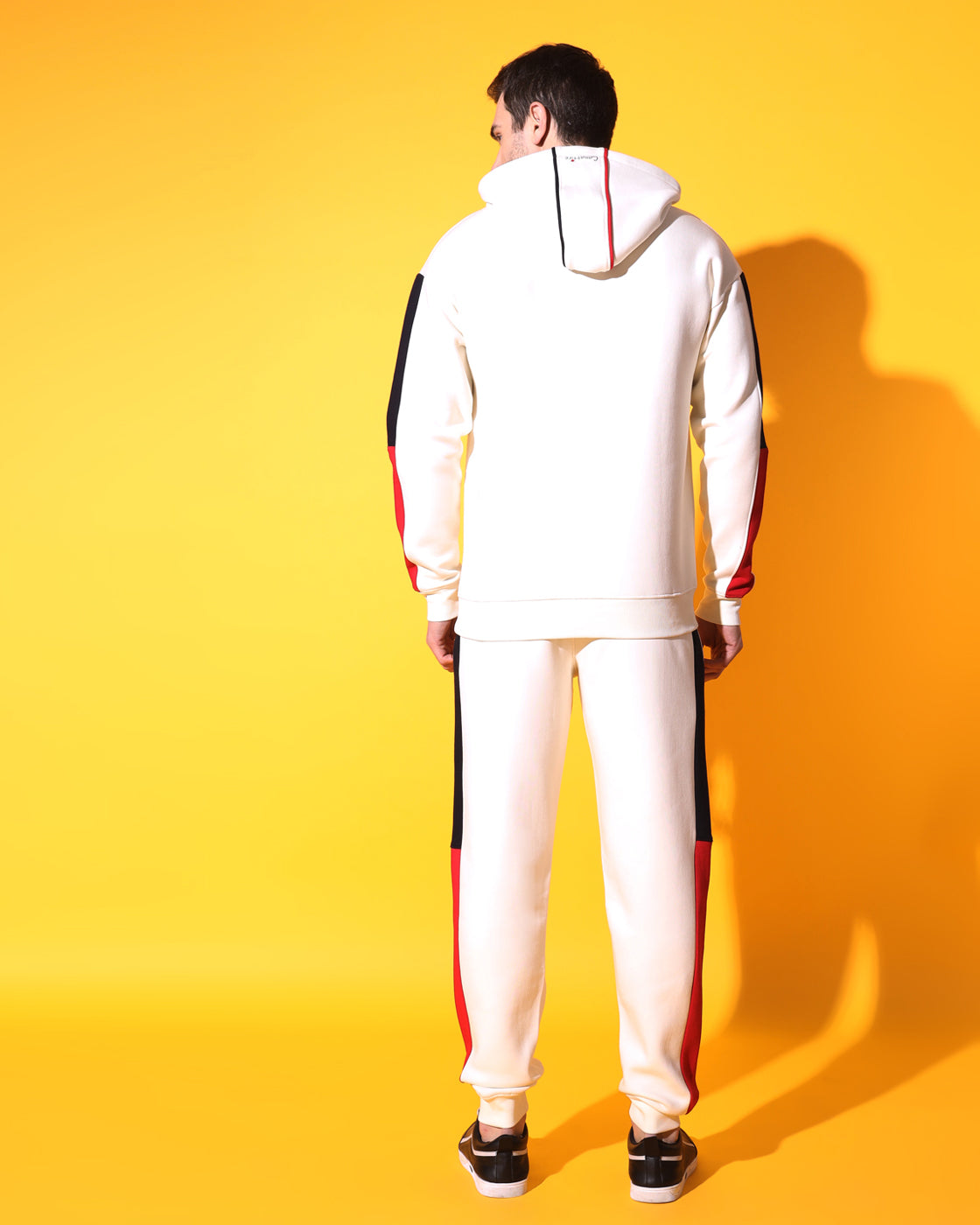 Dynamic Off White Track Suit: Bold Red and Navy Panel Design for Unisex Style