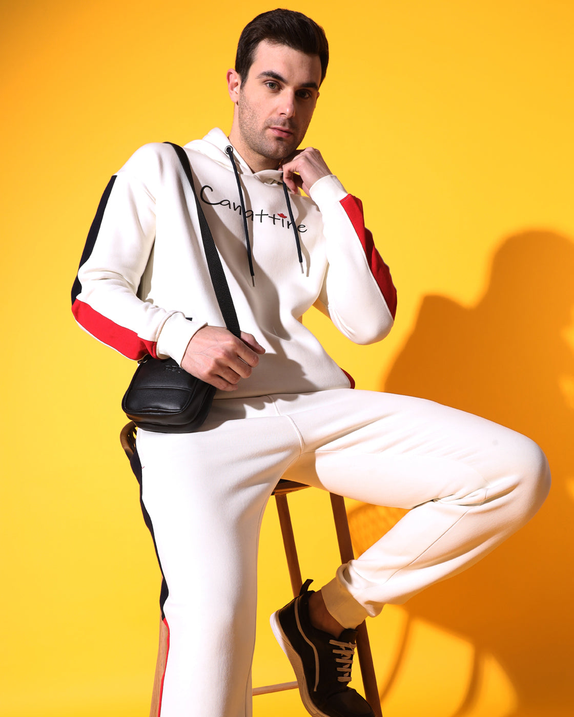 Dynamic Off White Track Suit: Bold Red and Navy Panel Design for Unisex Style