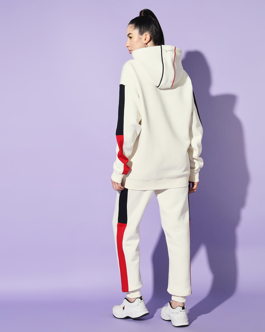 Dynamic Off White Track Suit: Bold Red and Navy Panel Design for Unisex Style